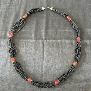 African black seed bead necklace with red and gold accent beads.  30in